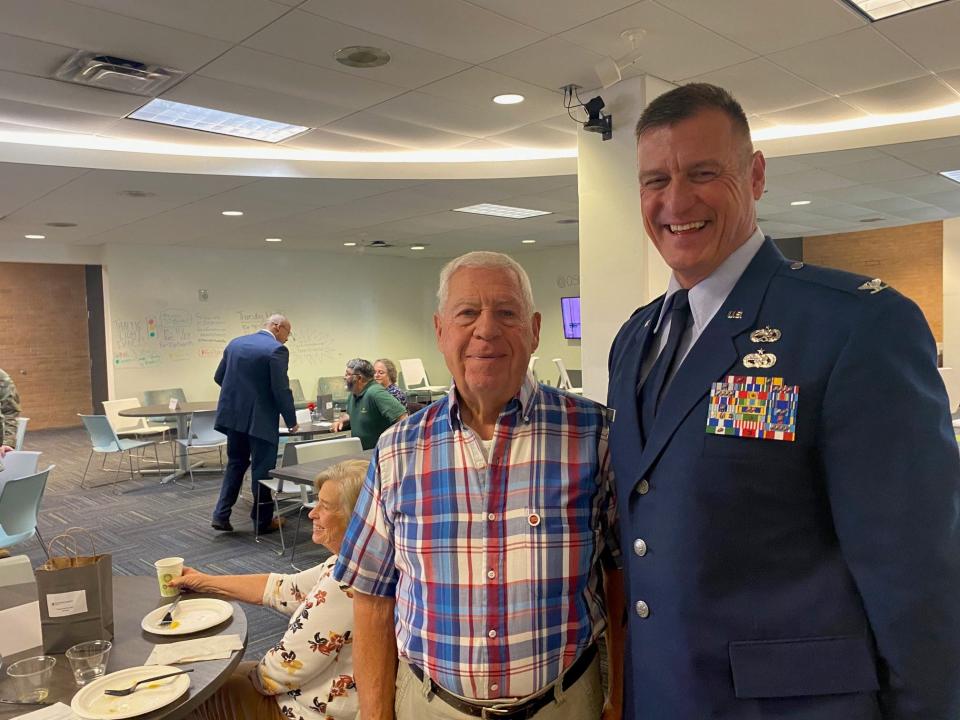 Col. Jerry Clark, deputy commander of the 179th Cyber Operations Group of the Ohio Air National Guard at Mansfield Lahm Airport, spoke to veterans Wednesday at The Ohio State University at Mansfield. At left is Larry Mowry of Mansfield, a U.S. Army veteran.