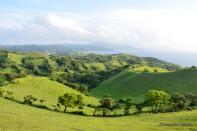 <strong>Batanes Islands.</strong> Isolated on the northernmost part of the country, the Batanes group of islands shows you nature at its best and life at its simplest. Desolate yet dramatic landscapes of verdant pasturelands, rolling hills and great turquoise seas, Batanes can help heal your tired, urban spirit. Or at the very least provide some incredible landscape photos to post in Facebook.