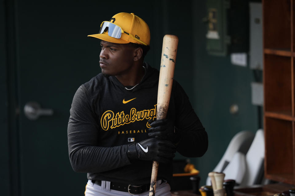 Pittsburgh Pirates second baseman Termarr Johnson stands in the dugout before a spring training baseball game against the Detroit Tigers Saturday, March 9, 2024, in Lakeland, Fla. (AP Photo/Charlie Neibergall)