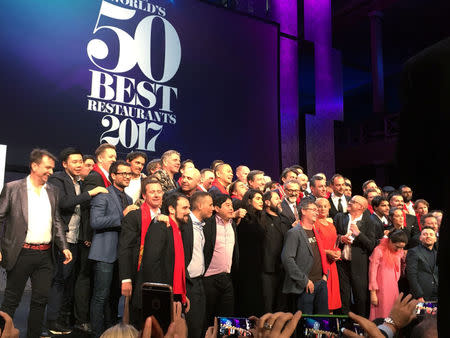 Participants pose for a group picture during the 50 Best Restaurants awards in Melbourne, Australia April 5, 2017. REUTERS/Sonali Paul