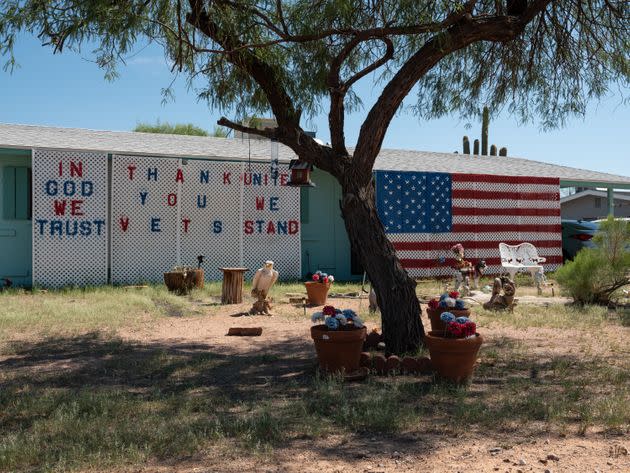 Patriotic decorations dominate a yard in Apache Junction, Arizona. (Photo: Molly Peters for HuffPost)