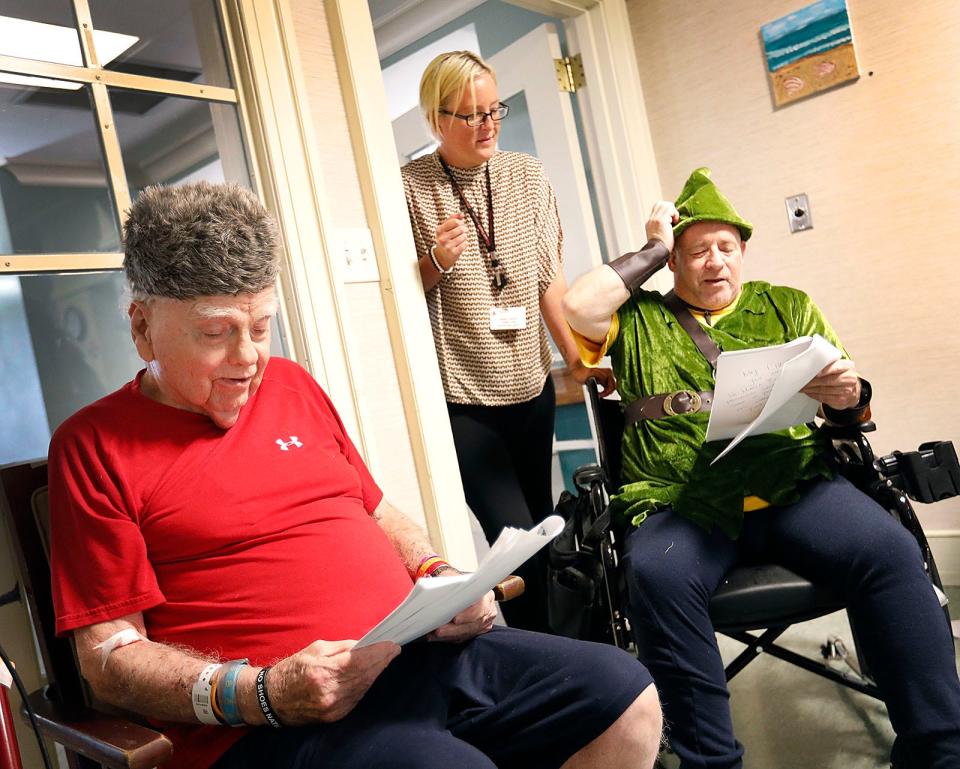 Donald Hay and Eric Flashner (Peter Pan) read their lines as activities director Erika Troup helps with pronunciation and emphasis if needed.