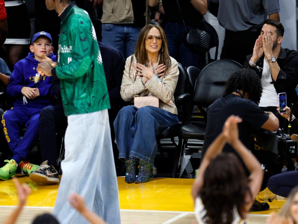 Jennifer Lopez thanks The Laker Girls after they finished off a dance with one of her songs during a break in the action between the Los Angeles Lakers and Golden State Warriors at Crypto.com Arena on March 16, 2024 in Los Angeles, California. NOTE TO USER: User expressly acknowledges and agrees that, by downloading and or using this photograph, User is consenting to the terms and conditions of the Getty Images License Agreement