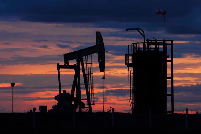 An oil pump at dusk.