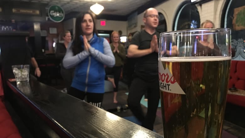 'Beer yoga' helps Windsorites stretch while they sip