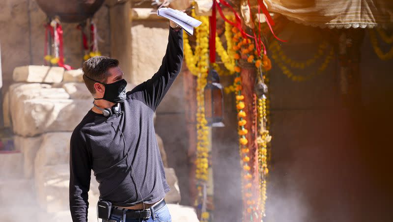 Director Dallas Jenkins shields his eyes from the light during filming of “The Chosen” at The Church of Jesus Christ of Latter-day Saints’ Jerusalem set in Goshen, Utah County, on Oct. 19, 2020.