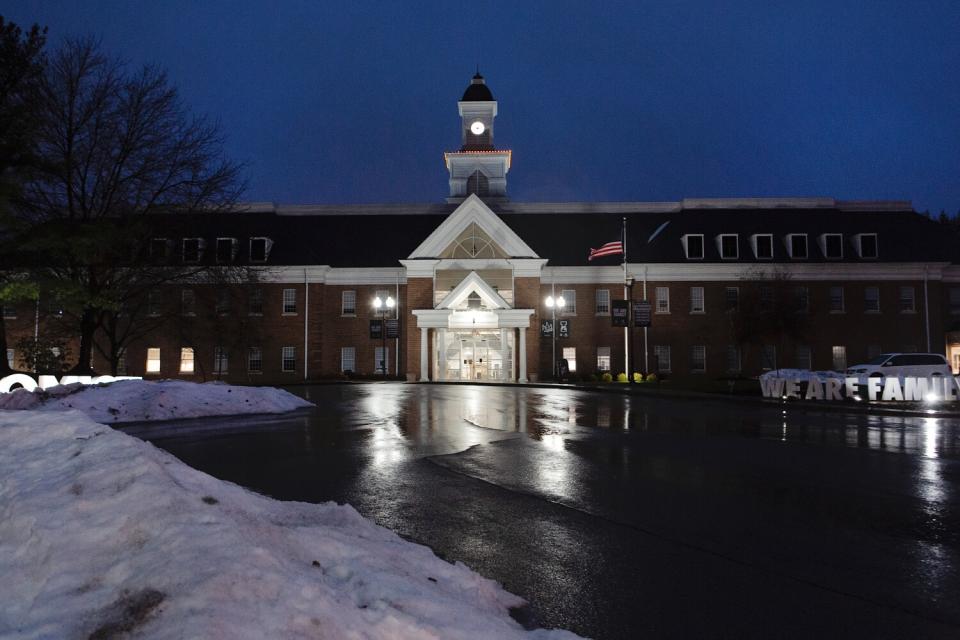 The I Promise School at dusk.