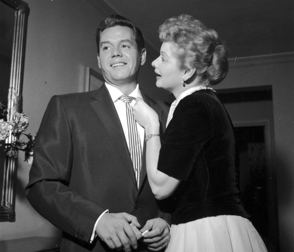 Having a moment with husband Desi Arnaz at New York City's Carlyle Hotel in February 1954.