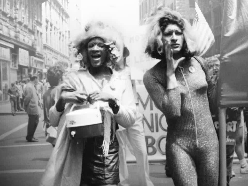 The “P” in Marsha P Johnson stood for “Pay it no mind” – and when people got too nosy about her, that is what she would tell them. Pay it no mind.Friends say the world heeded that advice, giving Johnson – a transgender activist who played a vital role in the Stonewall riots and the gay rights movement it launched – far less attention than she deserved.Now that’s finally changing.As New York prepares to mark the 50th anniversary of Stonewall alongside its Pride celebration, the city announced plans to build a statue honouring Johnson and her friend Sylvia Rivera, who also championed LGBT\+ rights.It will be the first permanent, public monument honouring transgender women in the world.“The city Marsha and Sylvia called home will honour their legacy and tell their stories for generations to come,” said New York City first lady Chirlane McCray.Johnson was born in 1945 and raised in Elizabeth, New Jersey.In a 1992 interview, she said she started wearing dresses at the age of five, but stopped after being teased.As soon as she graduated from high school, she went to New York with a bag of clothes and $15, she said.Although Greenwich Village was one of the most tolerant places for LGBT+ people at the time, police frequently harassed anyone who didn’t conform to sexual norms.There was no way someone like Johnson could get or keep a job. So, like a lot of gay, lesbian and transgender people at the time, she was frequently homeless and worked as a prostitute.Despite these hard circumstances, Johnson was known for her open and optimistic personality. She dressed in flashy, homemade outfits, and bedecked her hair in flowers, fruit and even Christmas lights.“I was no one, nobody from Nowheresville, until I became a drag queen,” she said.The word “transgender”, which describes people whose gender identity does not correspond to their birth sex, was not in use at the time.Johnson referred to herself using female pronouns, and at times described herself as “gay”, a “queen”, a “drag queen”, and a “transvestite”.She also had a religious streak. She was often seen praying for friends in neighbourhood churches, and said she would never get married because Jesus “is the only man I could really trust...he listens to all my problems, and he never laughed at me.”In the 2012 documentary Pay It No Mind: The Life and Times of Marsha P. Johnson, Stonewall veteran Agosto Machado said: “Marsha always gave this blessed presence and encouragement to be who you wanted to be.”Longtime friend Randy Wicker added: “Friends and many people who knew Marsha called her ‘Saint Marsha’, because she was so generous."Sylvia Rivera even credited Johnson with saving her life – a life marked by hellish trials from the beginning.Her father abandoned her at birth, and her mother killed herself when she was three.As a child, Rivera would try on her grandmother’s clothes and makeup, and was beaten when caught. By 11, she was a runaway and child prostitute.She met Johnson on the streets in 1963, when she was still a preteen.“She was like a mother to me,” Rivera said later. Johnson gave her a measure of stability and love she had never experienced.There are many stories about what Johnson and Rivera did in the early morning hours of 28 June 1969, when the Stonewall riots erupted.Almost everyone agrees they were there. One legend has Johnson throwing the first “shot glass heard around the world”; another has her throwing the first brick.Stonewall historian David Carter concluded it was “extremely likely” that Johnson was among the first people to resist the police.But in 1987, Johnson herself told historian Eric Marcus that she didn’t arrive until “the riots had already started”.And in 2001, Rivera said she was at the Stonewall Inn with a boyfriend when it was raided, but that she wasn’t the first to resist.In his book, The Gay Metropolis, Charles Kaiser suggested the first person to physically resist may have been a lesbian named Stormé DeLarverie, who died in 2014.In a 2018 essay, transgender poet Chrysanthemum Tran said the particulars of who-did-what don’t matter.Stonewall was a “collective uprising”, and Johnson and Rivera should be acknowledged not just for their actions on those few days, “but for their lifelong work of organising and activism”.In the wake of the riots, the pair were frequent organisers and participants at gay rights protests.They also founded Street Transvestite Action Revolutionaries, or STAR, and opened a house to shelter homeless LGBT+ youth – the first shelter of its kind in the country.But as the gay rights movement grew, some wanted people like Johnson and Rivera pushed out.Some gay and lesbian activists took the tack that they were no different than their straight peers, and thought that argument was harder to make if Johnson showed up in plastic heels and fruit in her hair.Things came to a head at the Pride March in 1973, when Rivera said she was repeatedly blocked from speaking.When she finally took the microphone, she shouted: “If it wasn’t for the drag queen, there would be no gay liberation movement. We’re the front-liners.” She was booed off the stage.After the speech, Rivera attempted suicide, she said; Johnson found her and saved her life.Rivera left activism and New York after the incident, but Johnson stayed.In the mid-1970s, Andy Warhol made her the subject of one of his famous silkscreen portraits.She also began performing in a drag revue called the Hot Peaches. In 1980, her housing situation finally stabilised when Wicker took her on as a roommate.As the AIDS crisis devastated the LGBT+ community in the 1980s, Johnson continued her work, marching with activist group ACT UP, helping at fundraisers, and nursing her friends on their death beds.Johnson’s body was found floating in the Hudson River on 6 July 1992.Her death was quickly ruled a suicide, but after protests, the cause was changed to an unexplained drowning.Johnson was repeatedly the victim of violent attacks, and many close to her think she was murdered. The case was reopened in 2012, and remains open.Rivera returned to New York after Johnson’s death. She struggled with addiction and lived by the pier where Johnson’s body was found.But by 2001, she was sober, marching in Pride parades, and living in Transy House, which was created by activists inspired by STAR.Rivera died of liver cancer in 2002. The Village Voice eulogised her as “the Rosa Parks of the modern transgender movement”. In the last hours of her life, she was urging gay leaders who had come to her bedside to be more inclusive.Now, as the 50th anniversary of the Stonewall riots approaches, the search begins for an artist to create a monument to two of the women who helped make it the turning point that it was.The Washington Post