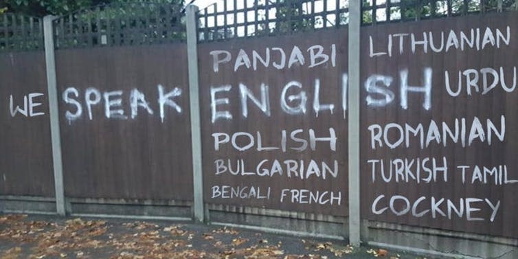 <span class="caption">Walthamstow resident Chris Walker was angry when he saw the message ‘We speak English’ in his neighbourhood. So he adapted it.</span> <span class="attribution"><span class="source">Chris Walker via Twitter</span></span>