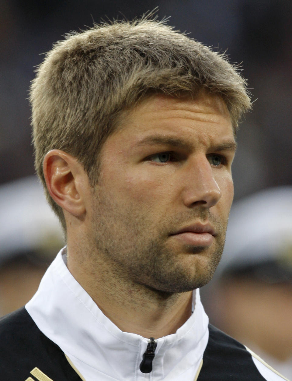 FILE - In this Oct. 14, 2009 file picture Germany's Thomas Hitzlsperger waits prior the World Cup Group 4 qualifying soccer match between Germany and Finland in Hamburg, northern Germany. Former Germany midfielder Thomas Hitzlsperger announced he is gay on Wednesday Jan. 8, 2014, becoming likely the most prominent footballer yet to break a long-standing taboo within the sport. Hitzlsperger says in an interview given to Die Zeit newspaper, “I am expressing my sexuality because I want to promote the discussion of homosexuality among professional athletes.” The 31-year-old says he felt now was the right time, four months after retirement following a career in England, Italy and Germany, to approach a subject he feels is “simply ignored.” (AP Photo/Joerg Sarbach,file)