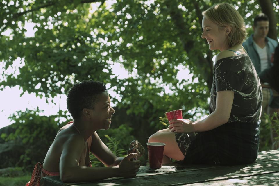 The Handmaid's Tale -- "Offred" -- Episode 101 -- Offred, one the few fertile women known as Handmaids in the oppressive Republic of Gilead, struggles to survive as a reproductive surrogate for a powerful Commander and his resentful wife. Moira (Samira Wiley) and Offred (Elisabeth Moss), shown. (Photo by: George Kraychyk/Hulu)