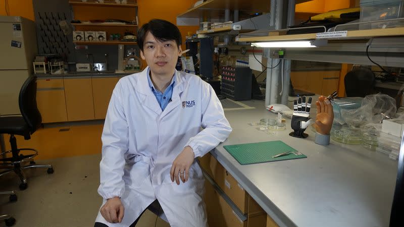 Dr. Benjamin Tee sits for an interview at a NUS lab in Singapore