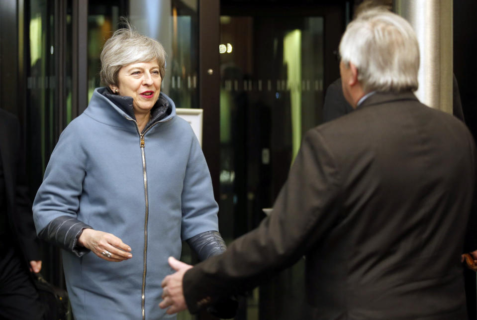 British Prime Minister Theresa May, left, is welcomed by European Commission President Jean-Claude Juncker in Strasbourg, France, Monday, March 11, 2019. May flew to Strasbourg, France, late Monday to try to secure a last-minute deal with the bloc. (Vincent Kessler/Pool Photo via AP)