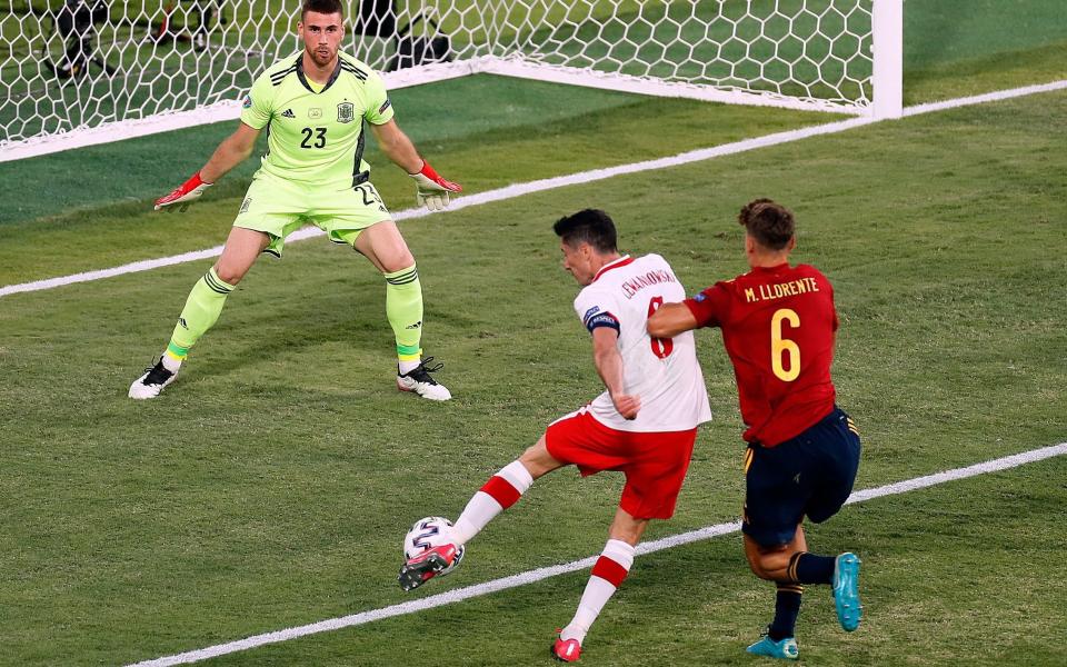 Lewandowski draws a fantastic save from Unai Simon - REUTERS