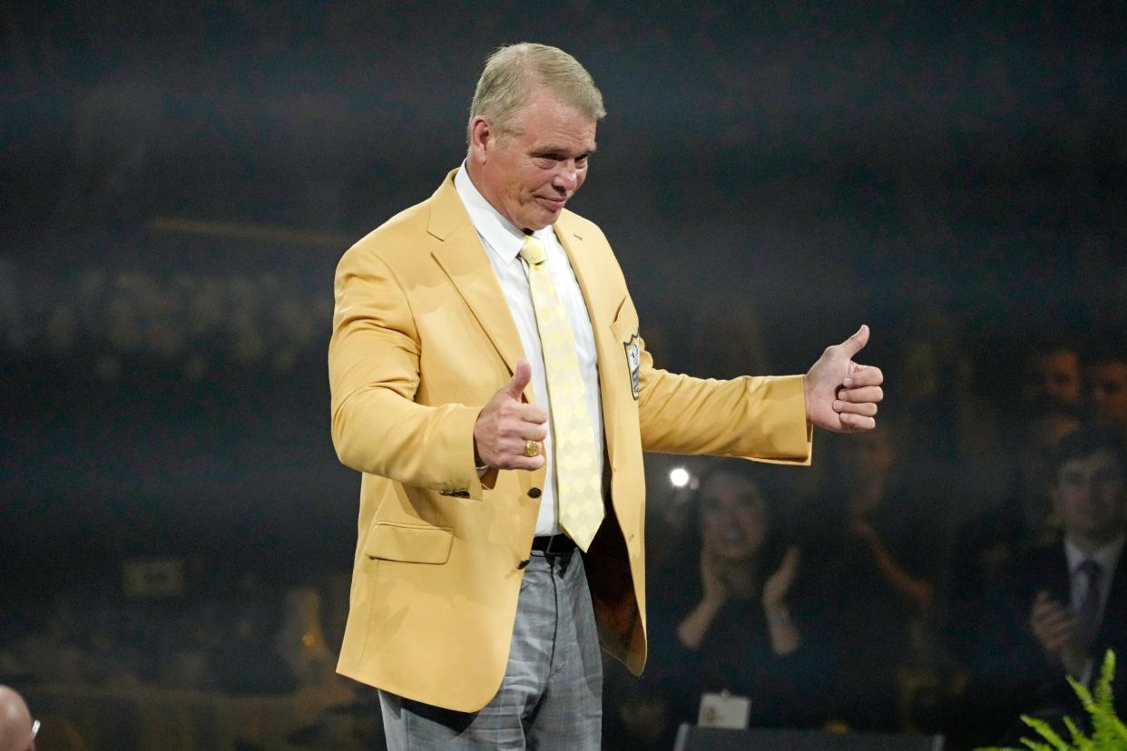 Joe Klecko, a member of the Pro Football Hall of Fame Class of 2023, receives his gold jacket, Friday, Aug. 4, 2023, in Canton.