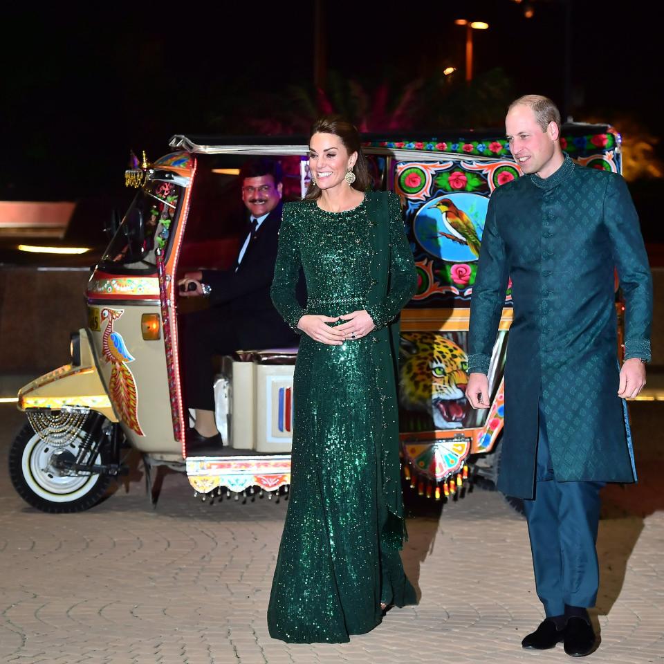 And the <a href="https://people.com/royals/kate-middleton-and-prince-william-just-had-their-most-glam-moment-in-pakistan-in-a-rickshaw/" rel="nofollow noopener" target="_blank" data-ylk="slk:couple arrived in style;elm:context_link;itc:0;sec:content-canvas" class="link ">couple arrived in style</a>: in a motorized rickshaw decorated in vibrant colors!