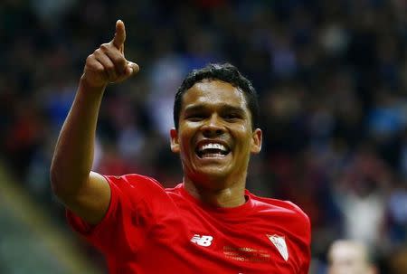 Football - Dnipro Dnipropetrovsk v Sevilla - UEFA Europa League Final - National Stadium, Warsaw, Poland - 27/5/15 Carlos Bacca celebrates scoring the third goal for Sevilla Reuters / Kai Pfaffenbach