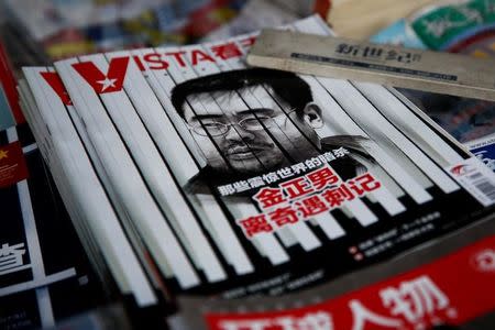 The cover of a Chinese magazine features a portrait of Kim Jong Nam, the late half-brother of North Korean leader Kim Jong Un, at a news agent in Beijing, China February 27, 2017. The headline reads: "Stranger than fiction assassination diary." REUTERS/Thomas Peter