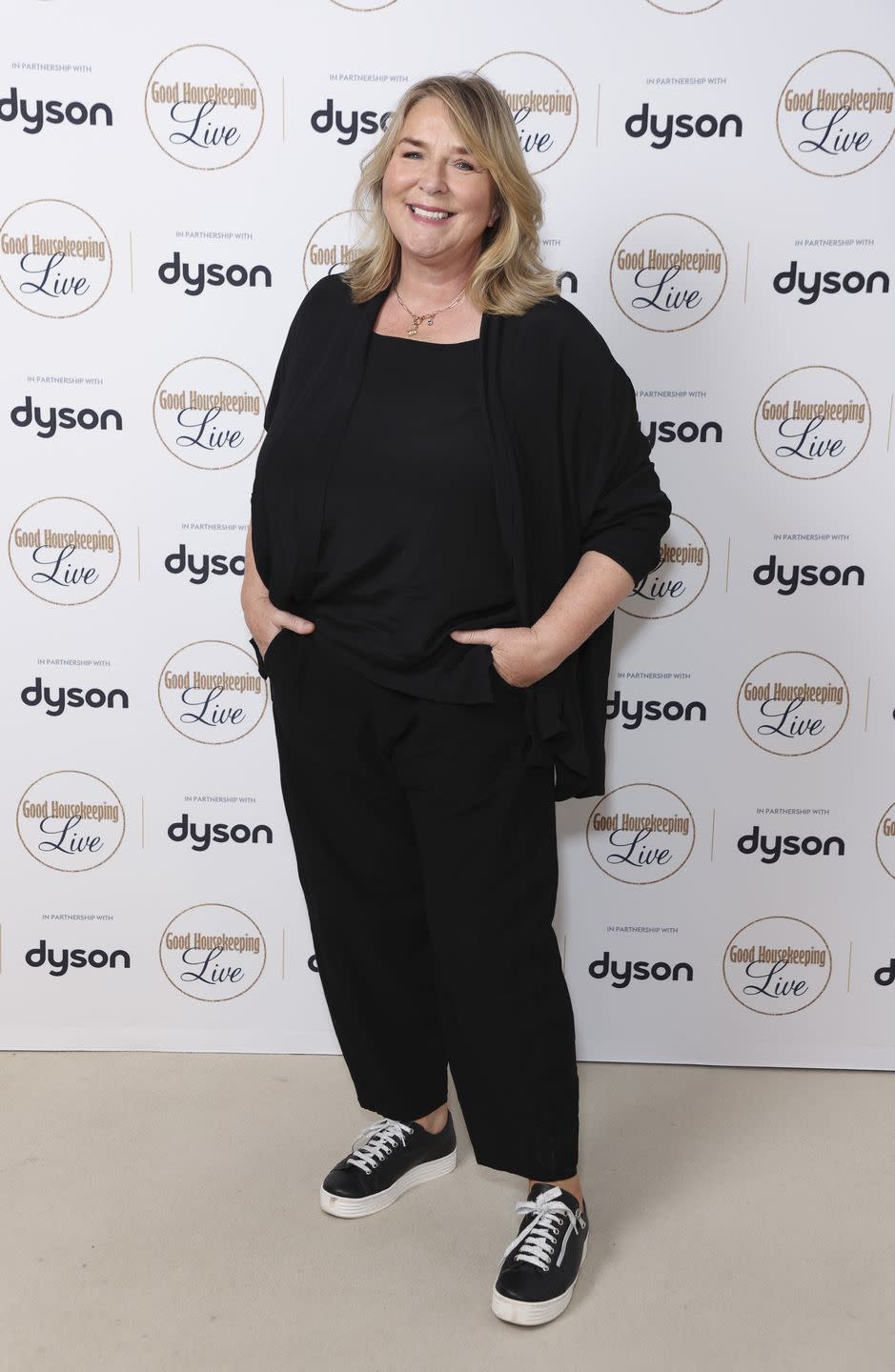 fern britton in a casual black outfit with sneakers on the good housekeeping live red carpet