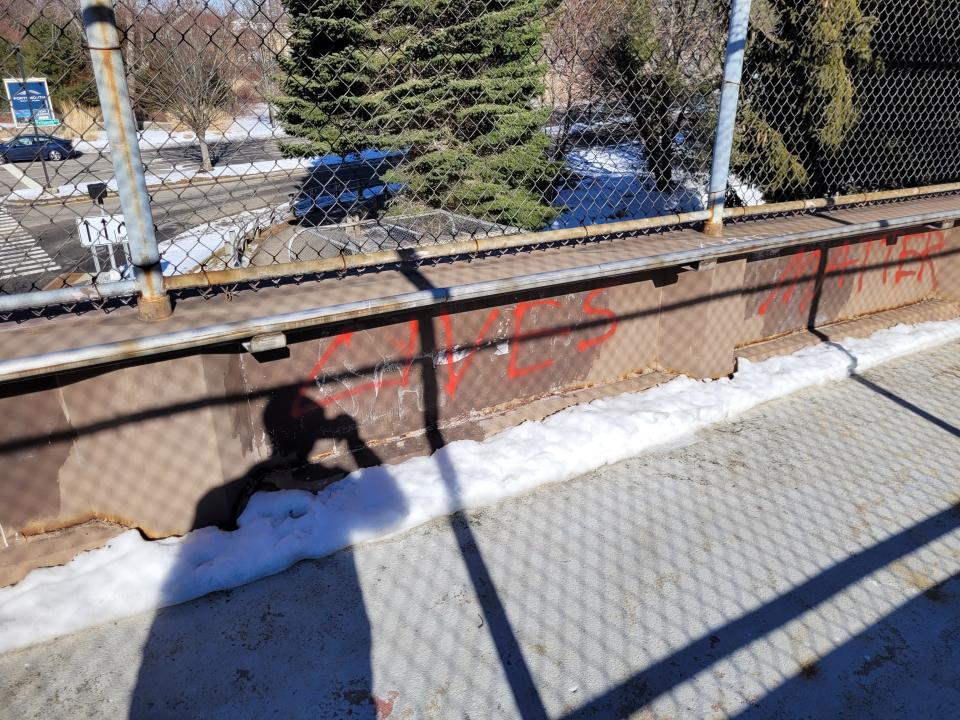 New hateful graffiti was found on a pedestrian bridge in Portsmouth on Friday, March 3, 2023, days after numerous downtown buildings and places of worship were targeted with similar vandalism.