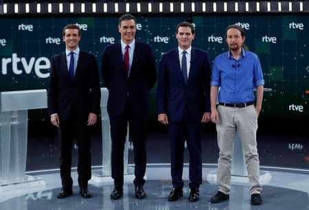 Main candidates for Spanish general elections People's Party (PP) Pablo Casado, Spanish Prime Minister and Socialist Workers' Party (PSOE) Pedro Sanchez, Ciudadanos' Albert Rivera and Unidas Podemos' Pablo Iglesias pose before a televised debate ahead of general elections in Pozuelo de Alarcon, outside Madrid, Spain, April 22, 2019. REUTERS/Sergio Perez