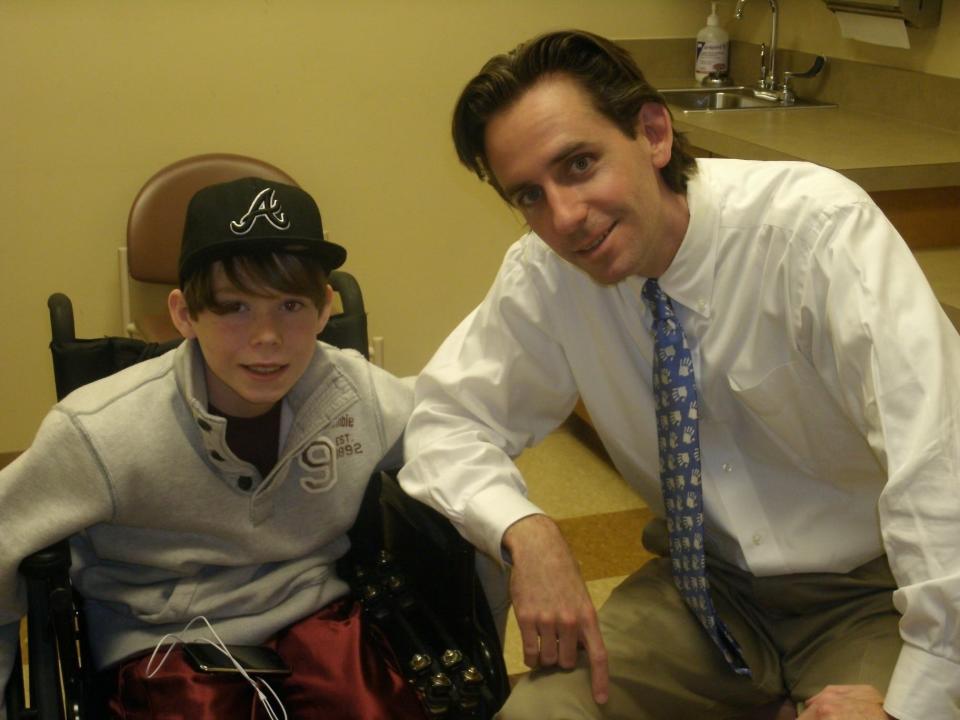 Chance Futrell at Le Bonheur as a child, with Dr. Derek Kelly.