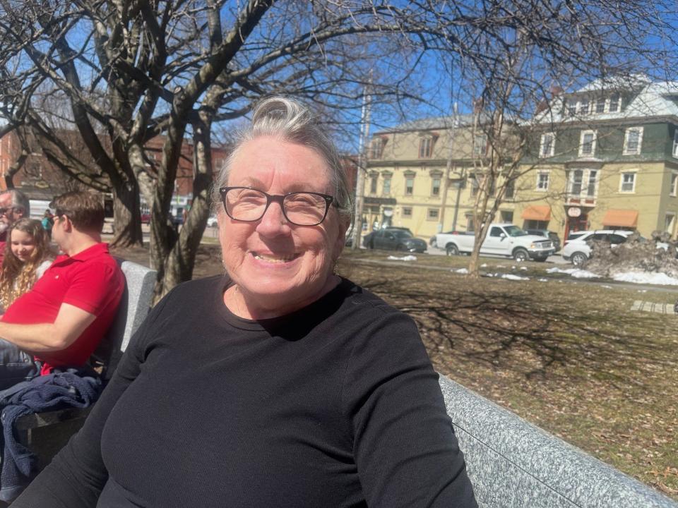 Barb Fell drove 1,600 miles from Minnesota to sit on a bench in Taylor Park in St. Albans, Vermont, to await the total eclipse. As seen on April 8, 2024.