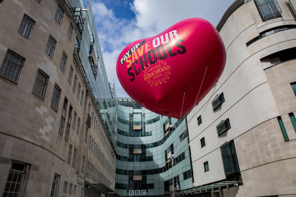 A Save Our Schools balloon belonging to the National Education Union (NEU) is pictured outside the BBC's Broadcasting House on 18 March 2023 in London, United Kingdom. Teachers in thousands of schools across England had been striking for an above-inflation pay rise but the government and NEU have now agreed to start pay talks. (photo by Mark Kerrison/In Pictures via Getty Images)