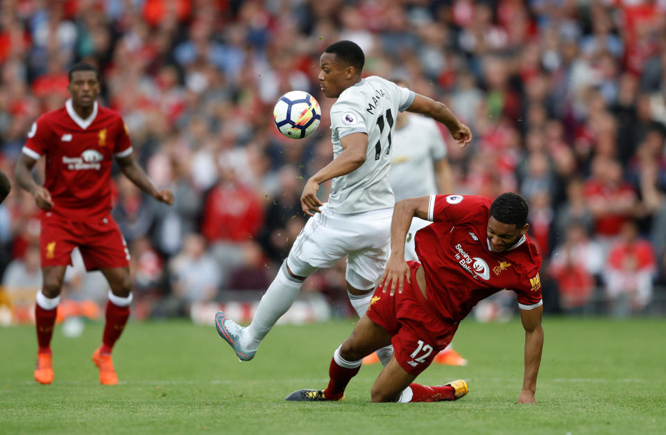 <p>Liverpool’s Joe Gomez denies Anthony Martial</p>