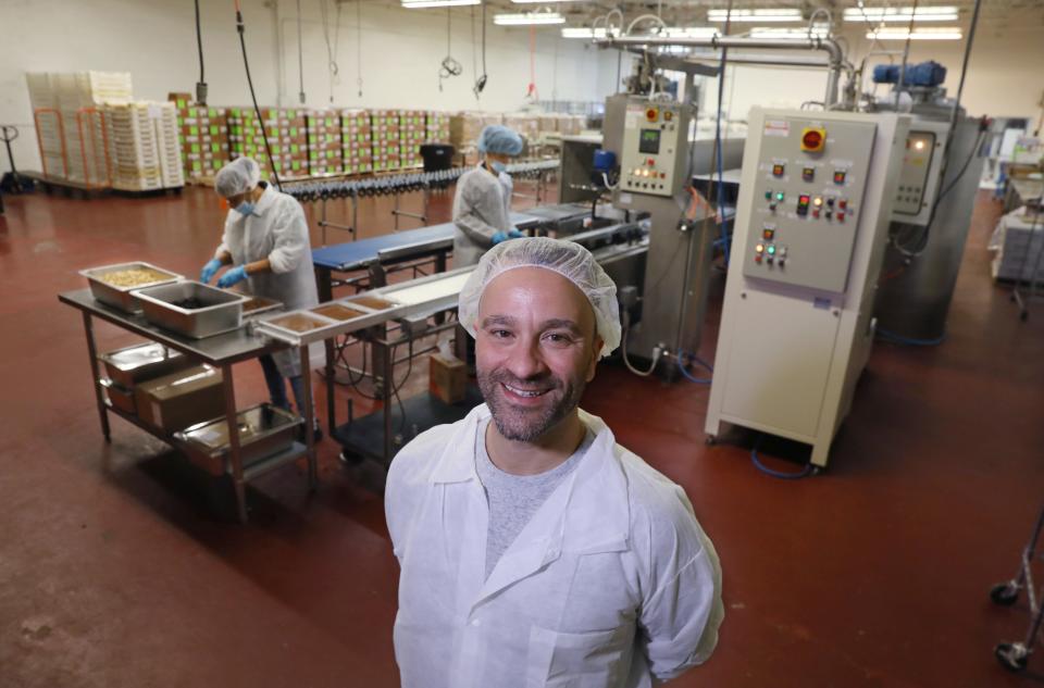 Alex Vigneri stands in the Emerson Street factory that was home to the family's chocolate business for decades.