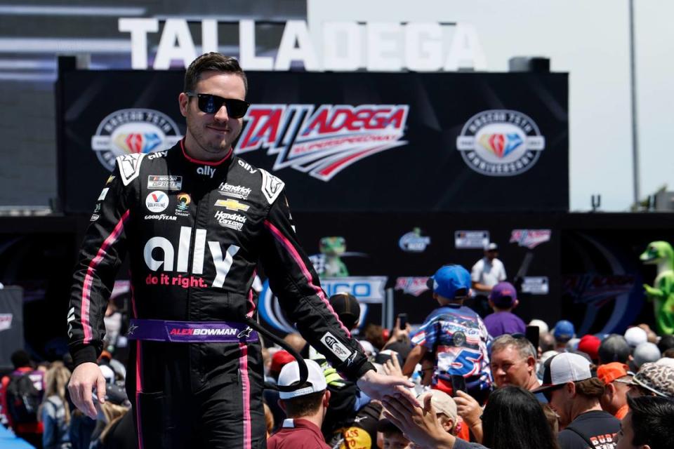 Alex Bowman greets fans before a NASCAR Cup Series auto race at Talladega Superspeedway, Sunday, April 23, 2023, in Talladega, Ala.