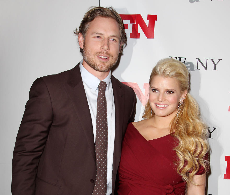 FILE - In this Nov. 29, 2011 file photo, singer Jessica Simpson, right, poses with Eric Johnson at the 25th Annual Footwear News Achievement Awards at The Museum of Modern Art in New York. Simpson's rep confirmed that the entertainer gave birth to Ace Knute in Los Angeles on Sunday, June 30, 2013, via planned C-section. This is the second child for Simpson and her fiance, Eric Johnson. Simpson gave birth to daughter Maxwell last year. (AP Photo/Starpix, Amanda Schwab, file)