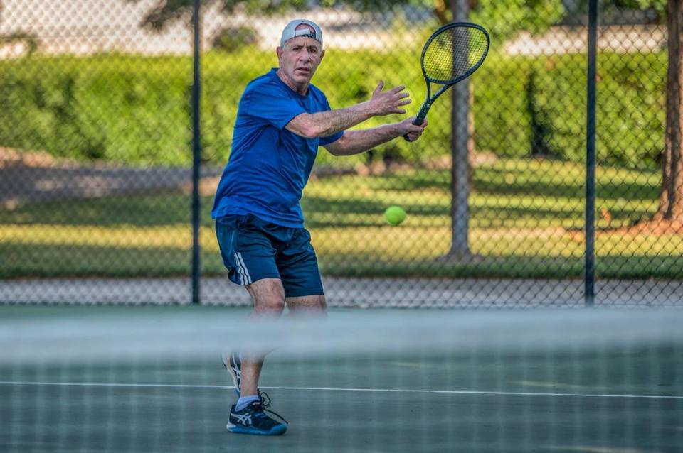 Darrell Steinberg plays tennis in May 2020, for the first time since the Garcia Bend Park courts were reopened to the public during the coronavirus outbreak. Departing the mayor’s office won’t mean retirement, he said. Renée C. Byer/Sacramento Bee file