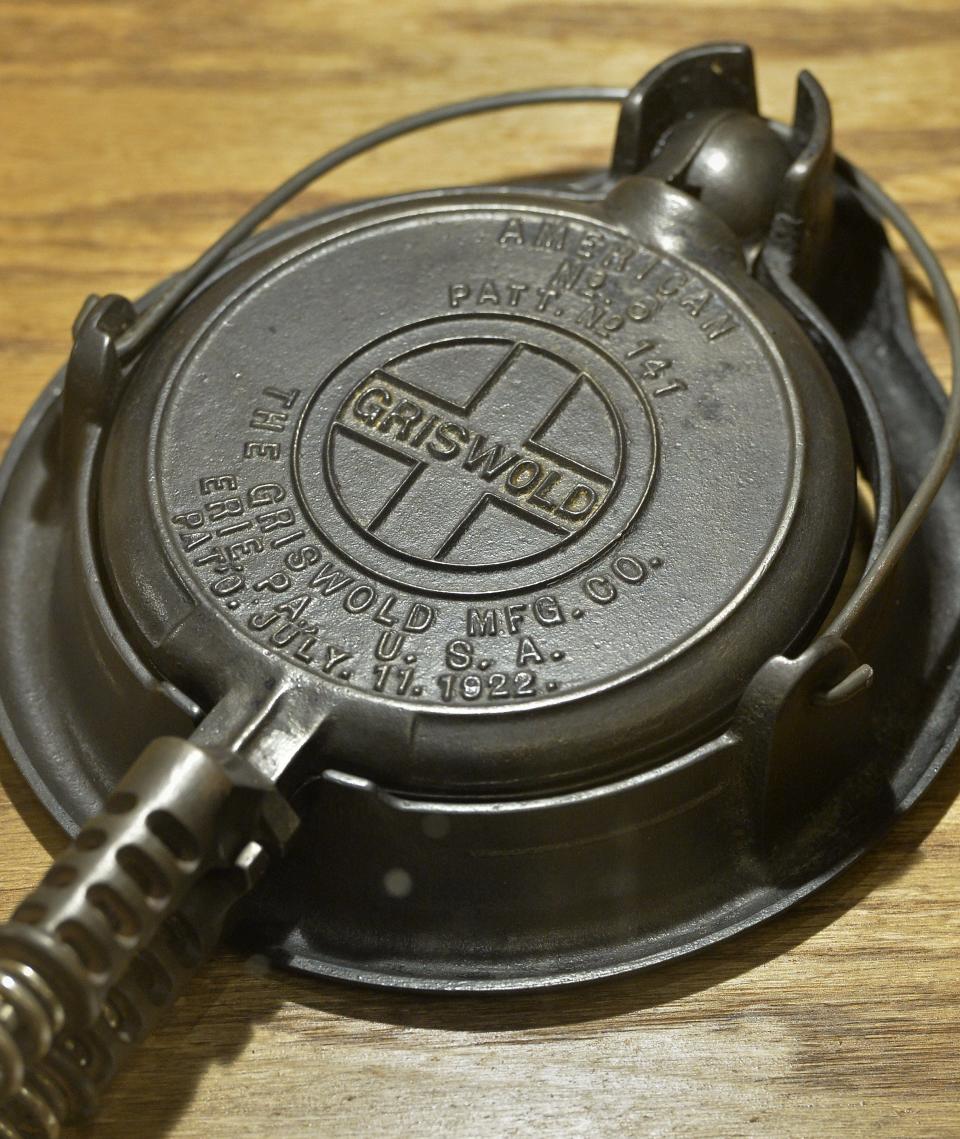 A waffle iron, sold between 1910 and 1940, part of a Griswold cookware exhibit in the Watson-Curtze Mansion, Thomas B. Hagen History Center, is shown in Erie on Nov. 2, 2019.