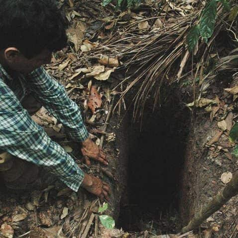 One of the holes dug by the man for hunting and protection - Credit: Fiona Watson