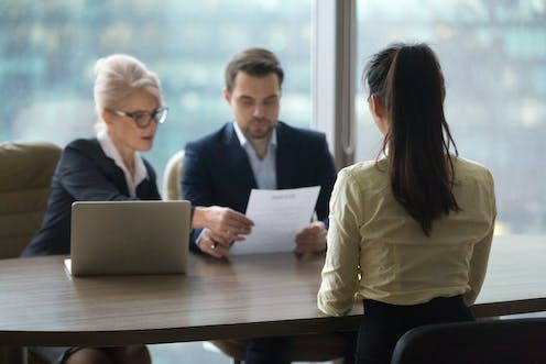 <span class="caption">Hiring algorithms could filter candidates before interviews even take place.</span> <span class="attribution"><a class="link " href="https://www.shutterstock.com/image-photo/back-view-female-candidate-apply-position-1191901783" rel="nofollow noopener" target="_blank" data-ylk="slk:fizkes / Shutterstock;elm:context_link;itc:0;sec:content-canvas">fizkes / Shutterstock</a></span>