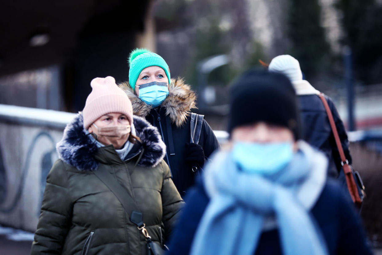People are wearing face masks during the fifth wave of the coronavirus pandemic in Krakow, Poland. January 18, 2022. Beata Zawrzel/NurPhoto via Getty Images