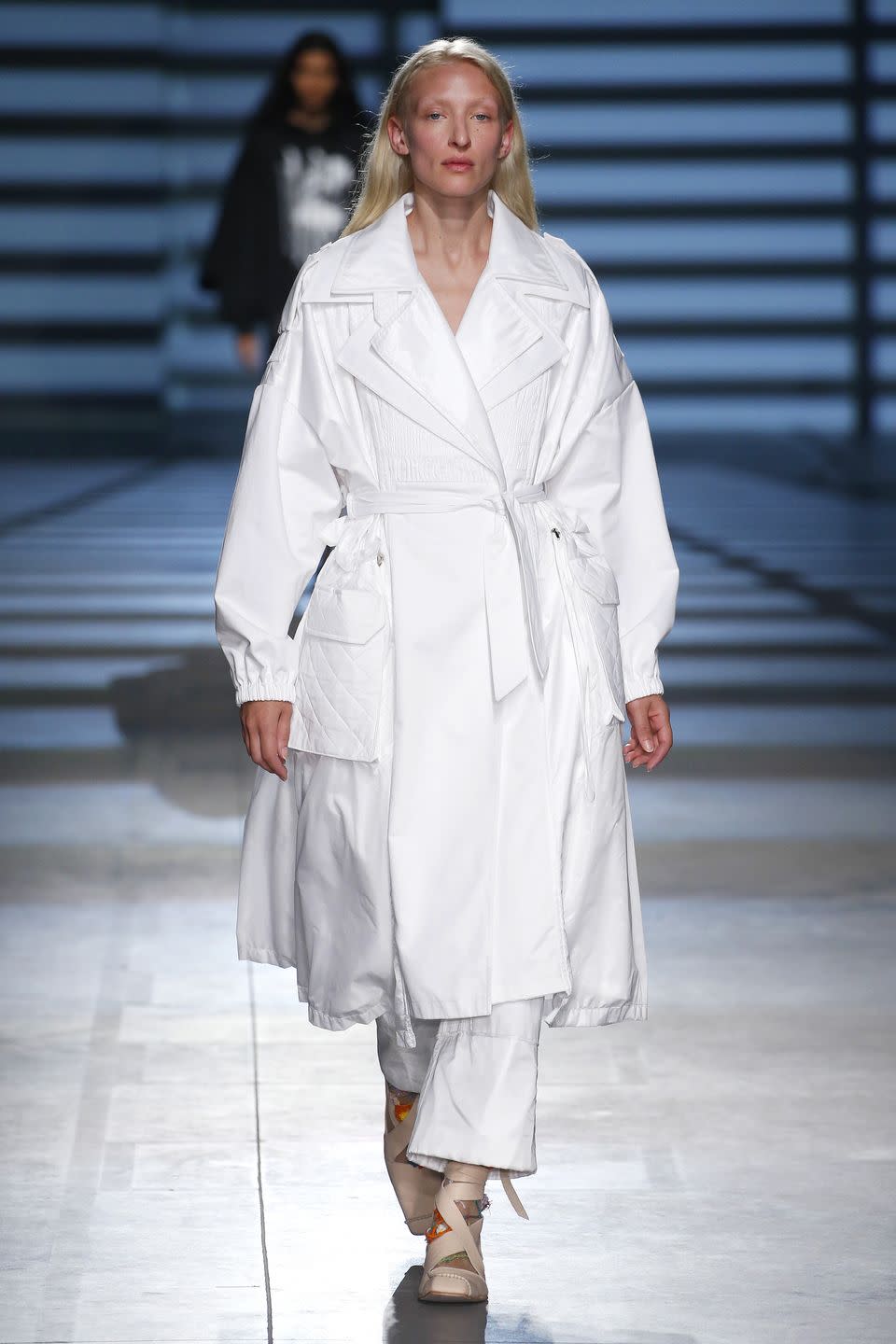 <p>When choosing a winter coat, opt for an open-front multi-layered streamline coat, like this white trench seen at Preen by Thornton Bregazzi at London Fashion Week. The belt and oversized pockets help to detract from the decolletage.</p><p>Eg Alexander McQueen, Belted cotton-gabardine and houndstooth wool trench coat - £2,450</p><p><a class="link " href="https://go.redirectingat.com?id=127X1599956&url=https%3A%2F%2Fwww.net-a-porter.com%2Fgb%2Fen%2Fproduct%2F1159993%2FAlexander_McQueen%2Fbelted-cotton-gabardine-and-houndstooth-wool-trench-coat&sref=http%3A%2F%2Fwww.elle.com%2Fuk%2Ffashion%2Fwhat-to-wear%2Fg29055066%2Fbig-breasts-runway-looks%2F" rel="nofollow noopener" target="_blank" data-ylk="slk:SHOP NOW;elm:context_link;itc:0;sec:content-canvas">SHOP NOW</a></p>