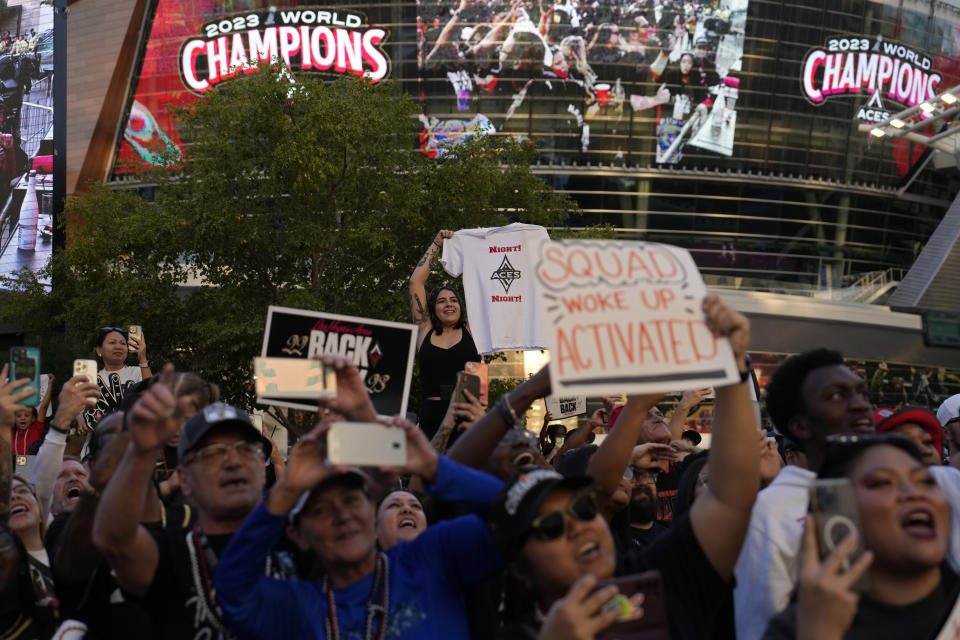 Las Vegas Aces fans cheer during a rally to celebrate the team's WNBA championship Monday, Oct. 23, 2023, in Las Vegas. (AP Photo/John Locher)