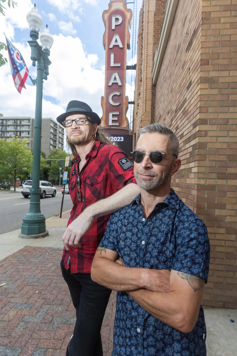 Ken Harding, left, and Jay Secrest of New Wave Nation are shown outside the Canton Palace Theatre, where they will hold a 25th anniversary concert at 7:30 p.m. today. Tickets are $25.