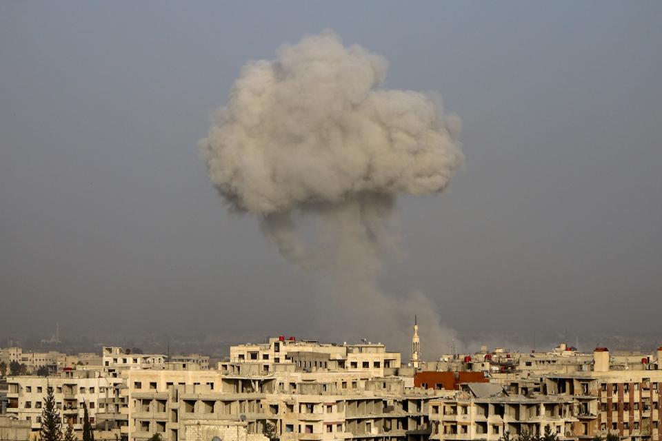 Smoke rises after airstrikes on eastern Ghouta's town of Kafr Batna in Syria on Friday. (Photo: Ammar Al-Bushy/Anadolu Agency via Getty Images)