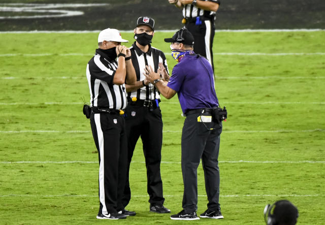 Ravens' Harbaugh stands by 4th-down call in loss to Bills