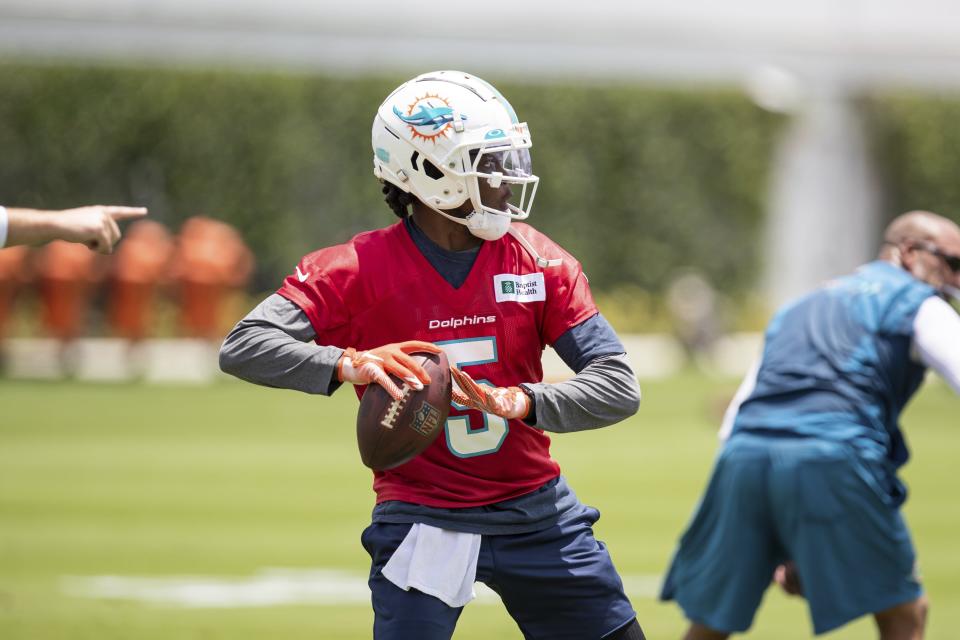 Miami Dolphins quarterback Teddy Bridgewater (5) takes part in drills at the NFL football team's practice facility in Miami Gardens, Fla., Tuesday, May 17, 2022. (AP Photo/Mary Holt)
