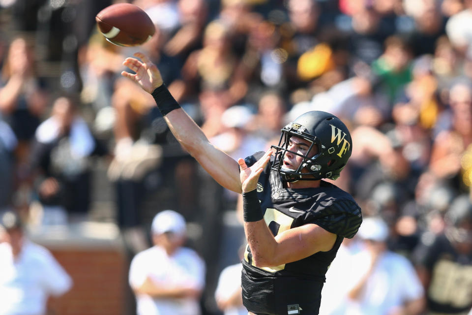 Sep 22, 2018; Winston-Salem, NC, USA; Wake Forest Demon Deacons quarterback Sam Hartman (10) passes the ball in the first quarter against the Notre Dame Fighting Irish at BB&T Field. Mandatory Credit: Jeremy Brevard-USA TODAY Sports