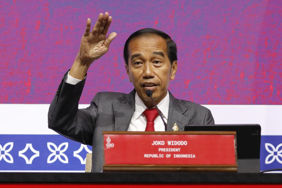Indonesian President Joko Widodo gestures as he speaks during a press conference at the G20 Leaders' Summit in Nusa Dua, Bali, Indonesia, Wednesday, Nov. 16, 2022. (Ajeng Dinar Ulfiana/Pool Photo via AP)