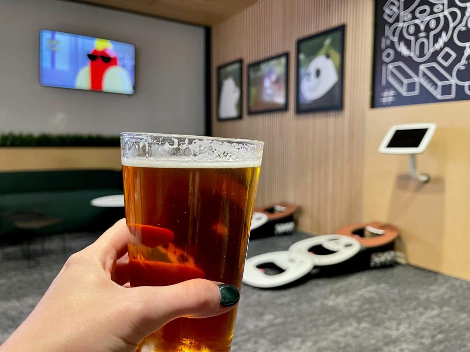 holding beer in cartoon network hotel