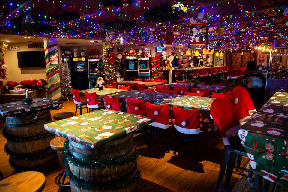 Hundreds of holiday decorations decorate the lounge at Bam Entertainment Center. The "Blitzen Bar" is a family-friendly space during the day, but switches to adults-only after 8 p.m.