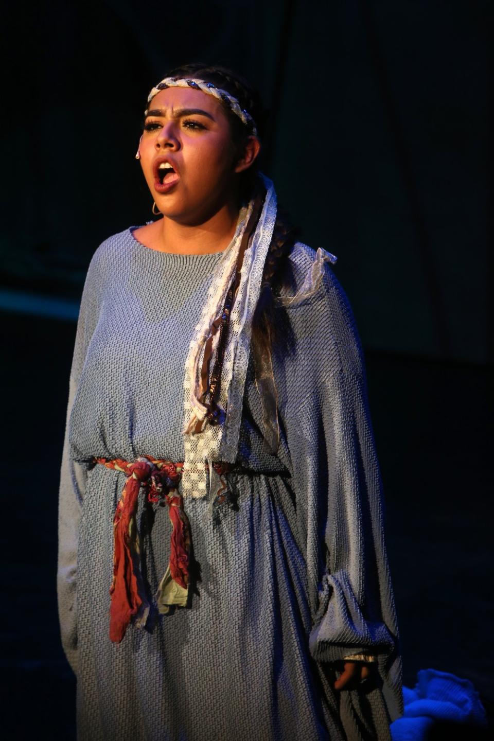 Estefani Lopez performs during a final dress rehearsal of "Amahi and the Night Visitors," at LA County High School for the Arts