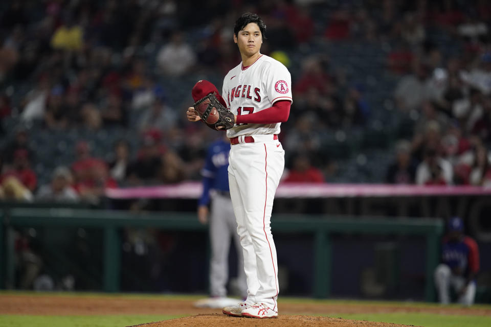 Los Angeles Angels starting pitcher Shohei Ohtani stands on the mound during the seventh inning of a baseball game against the Texas Rangers Friday, Sep. 3, 2021, in Anaheim, Calif. (AP Photo/Ashley Landis)